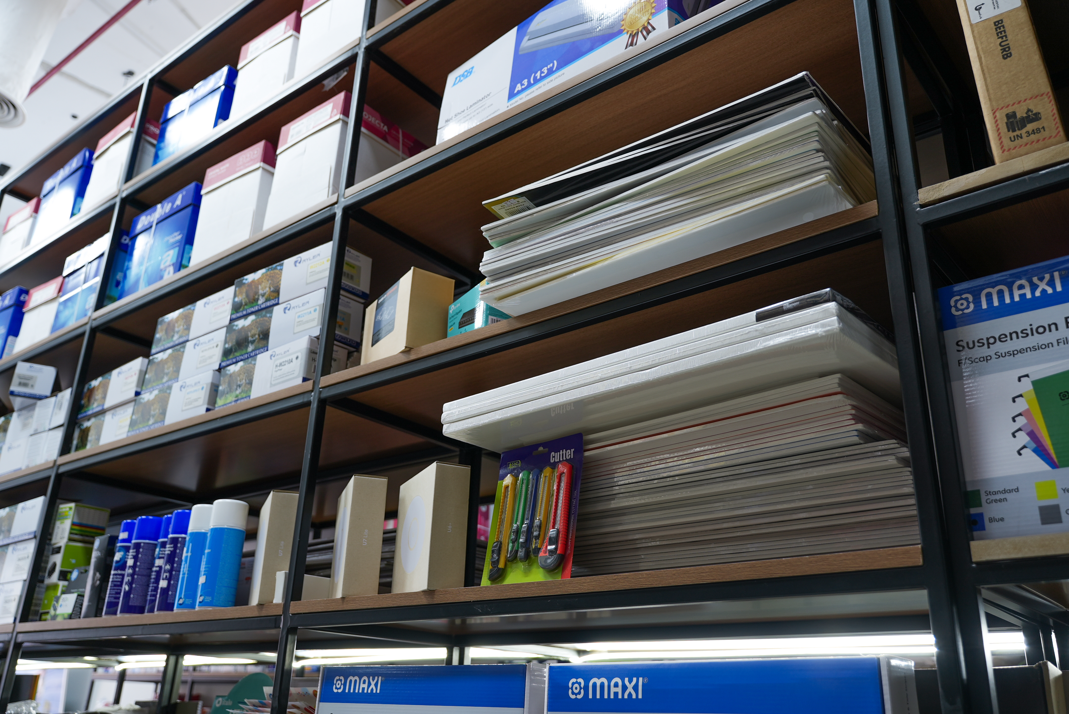 Paper reams and files shelves at Al Nukhbah stationery store